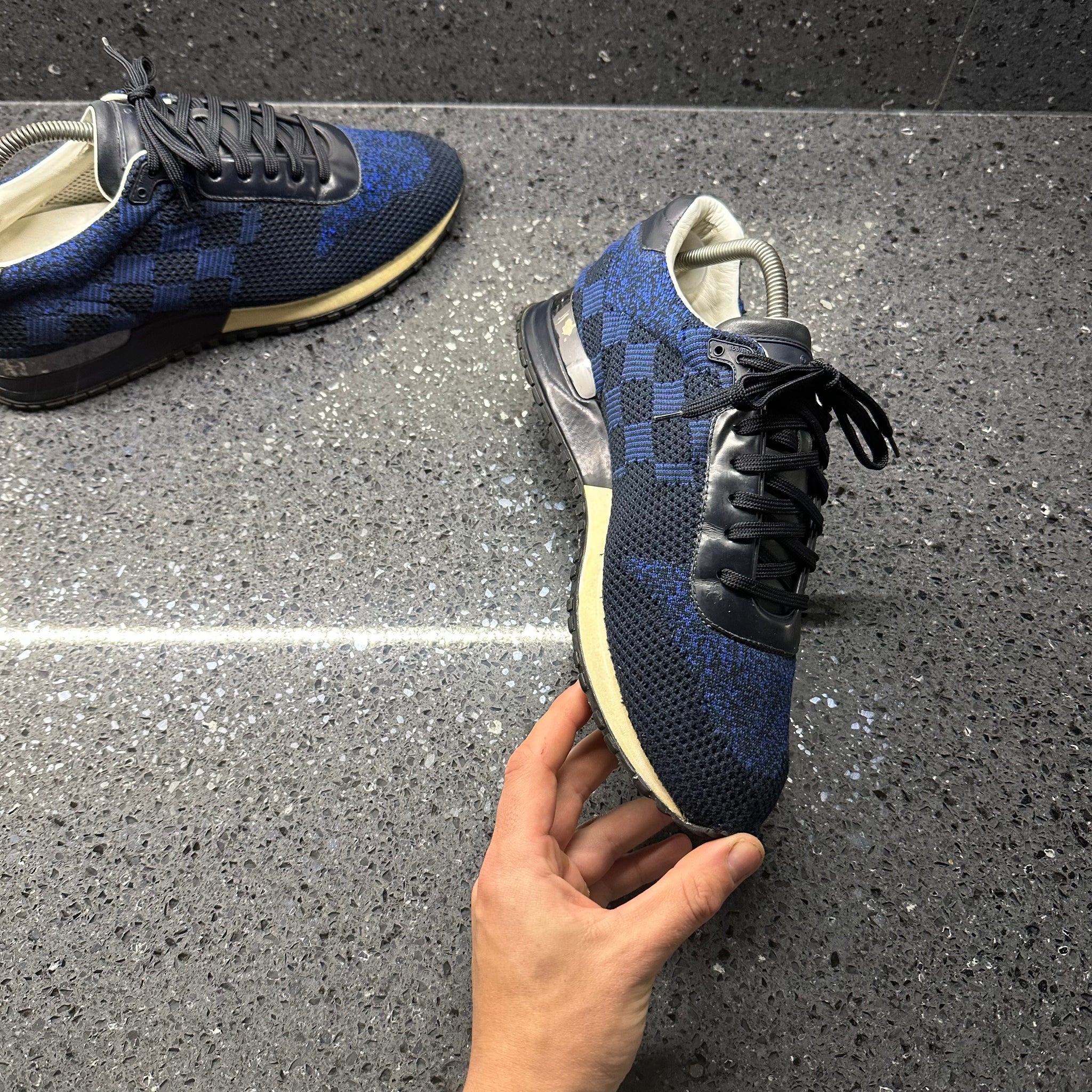 Men’s pre loved Louis Vuitton sneakers in Navy blue and black Damier. Dominic Puckerin | This edition of the LV Trainer sneaker  main image 4